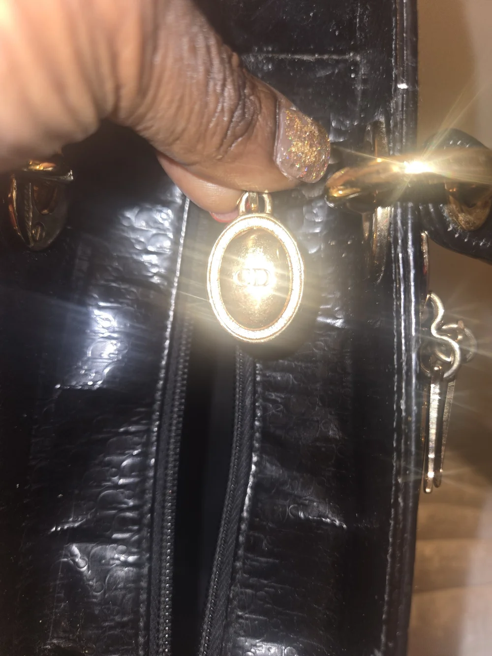Black Structured Patent Leather Top-Handle Bag with Gold Hardware